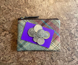 Brown and green wool purse with card and coins